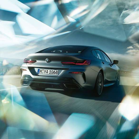 BMW M850i xDrive Gran Coupé, vue de trois quarts arrière Vue arrière de trois quarts de la BMW M850i xDrive Gran Coupé G16 2019 BMW Individual Frozen Bluestone metallic