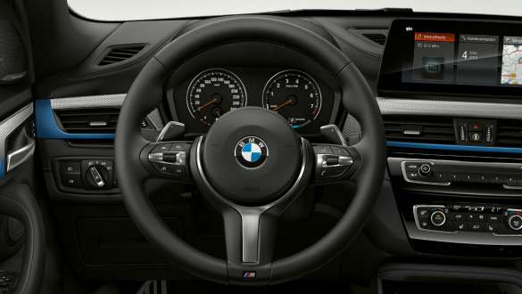 BMW X1, volant multifonctions. BMW X1, intérieur avec Kit M Sport et M Sport Steering.