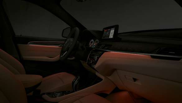 BMW X1, pack d’éclairage. BMW X1, intérieur avec pack d'éclairage activé.