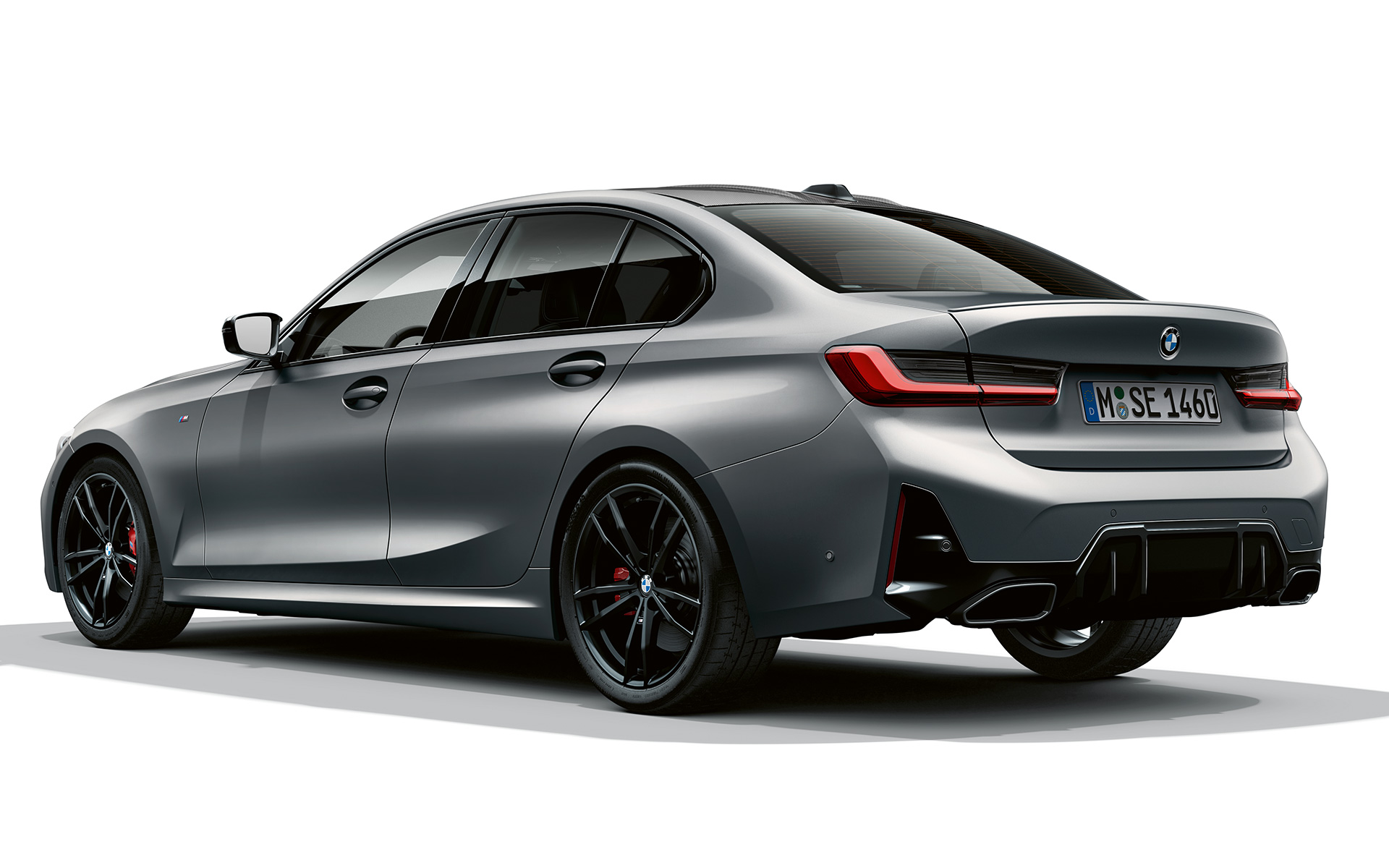 Becquet arrière M BMW M340i xDrive Berline G20 BMW M340i xDrive Berline G20 BMW Individual Frozen Pure Grey metallic vue de trois quarts arrière becquet arrière M